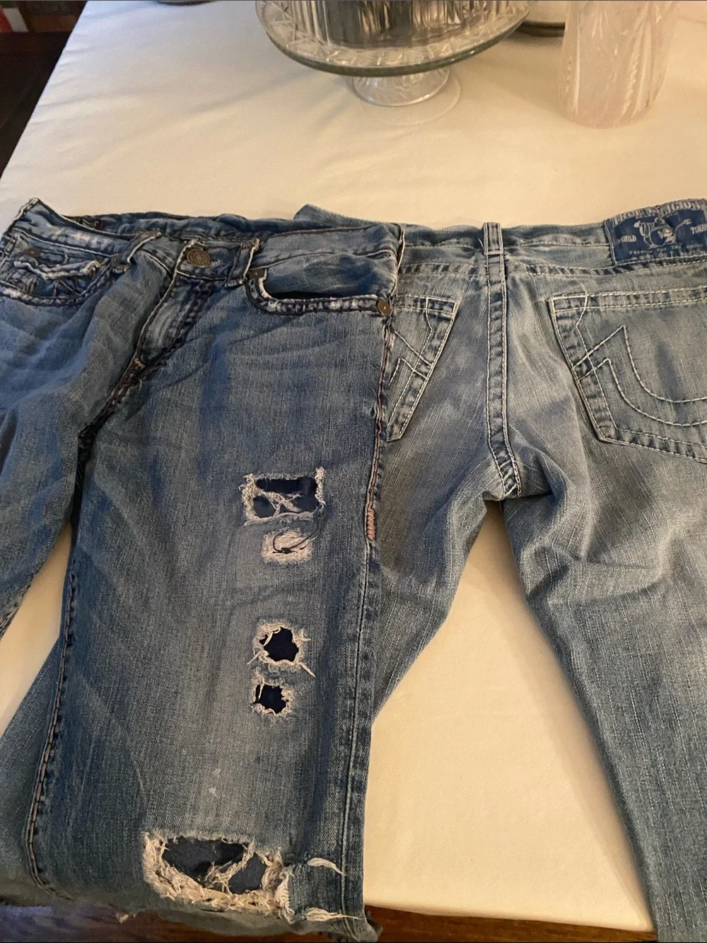 Two pairs of Vintage made in USA Men's True Religion Jeans.